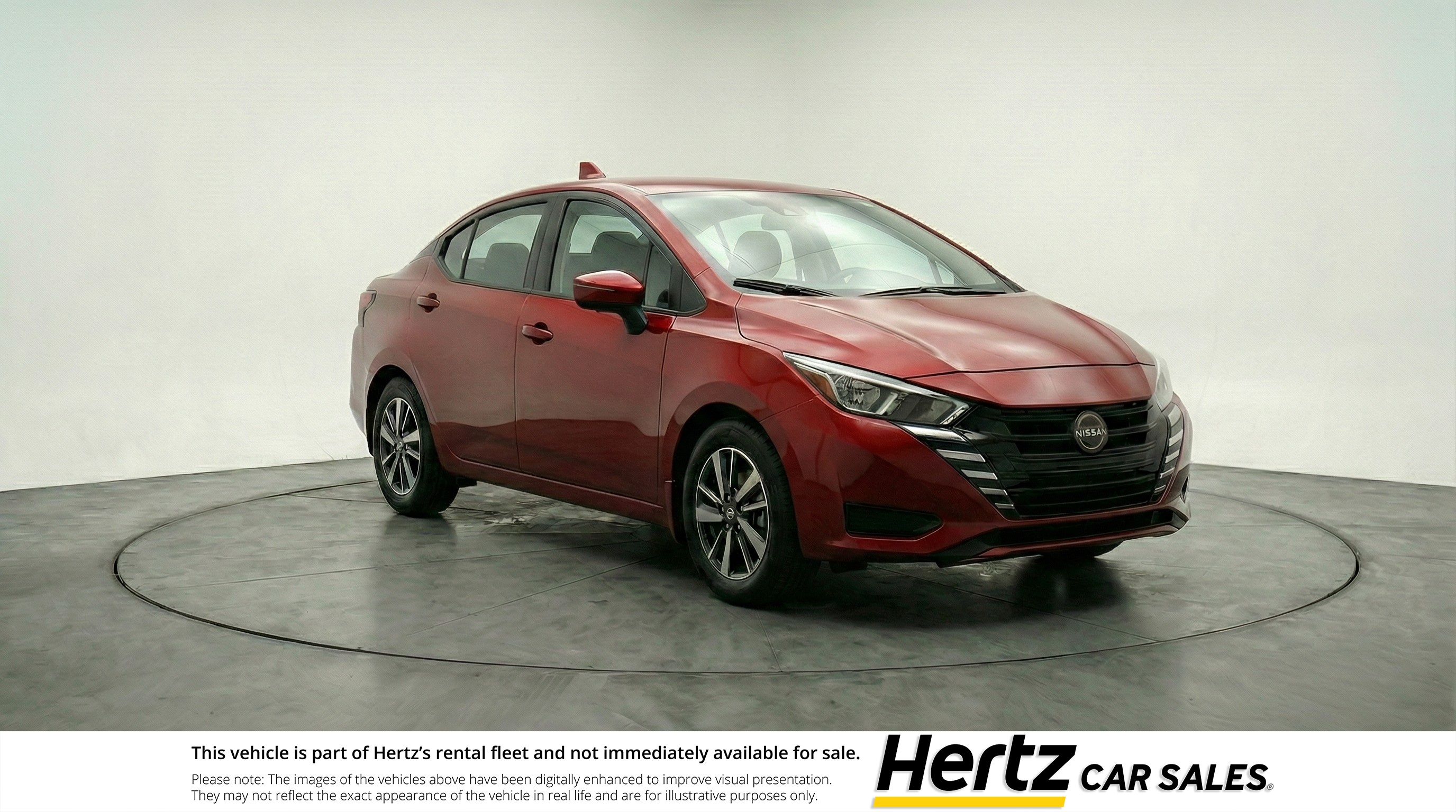 Red 2025 Nissan Versa SV FWD Sedan Front-Wheel Drive Automatic
