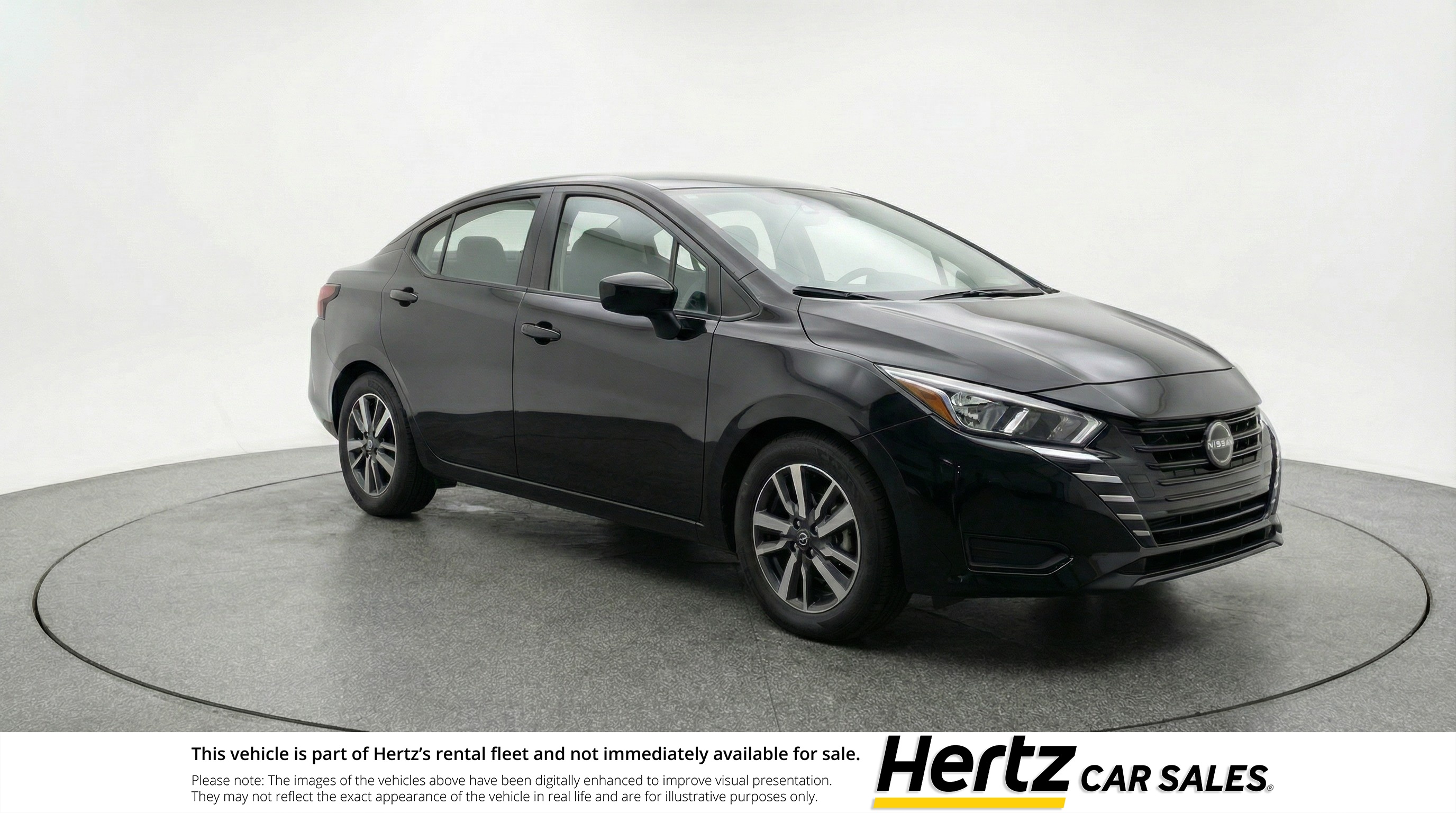 Black 2025 Nissan Versa SV FWD Sedan Front-Wheel Drive Automatic