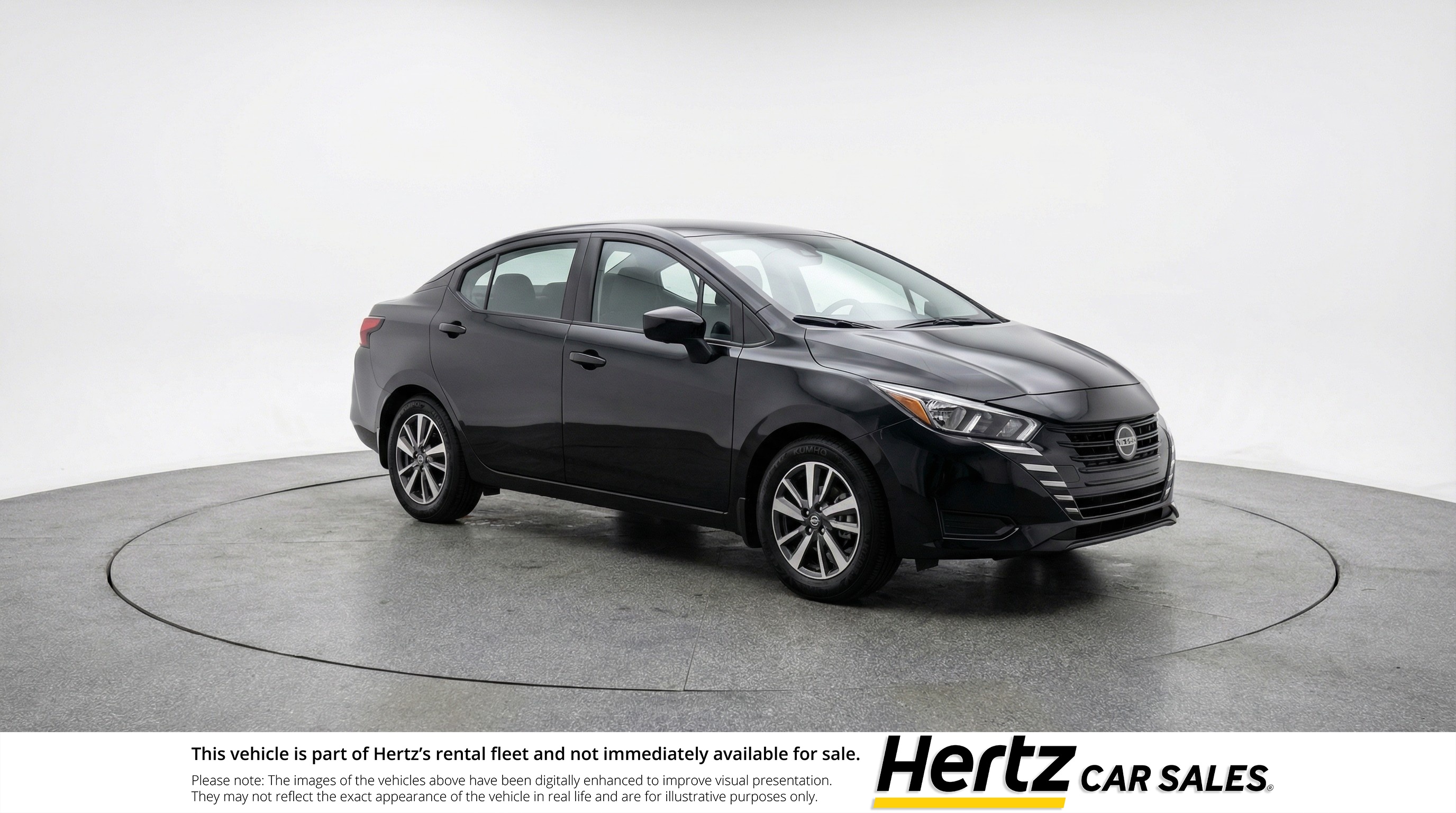 Black 2025 Nissan Versa SV FWD Sedan Front-Wheel Drive Automatic