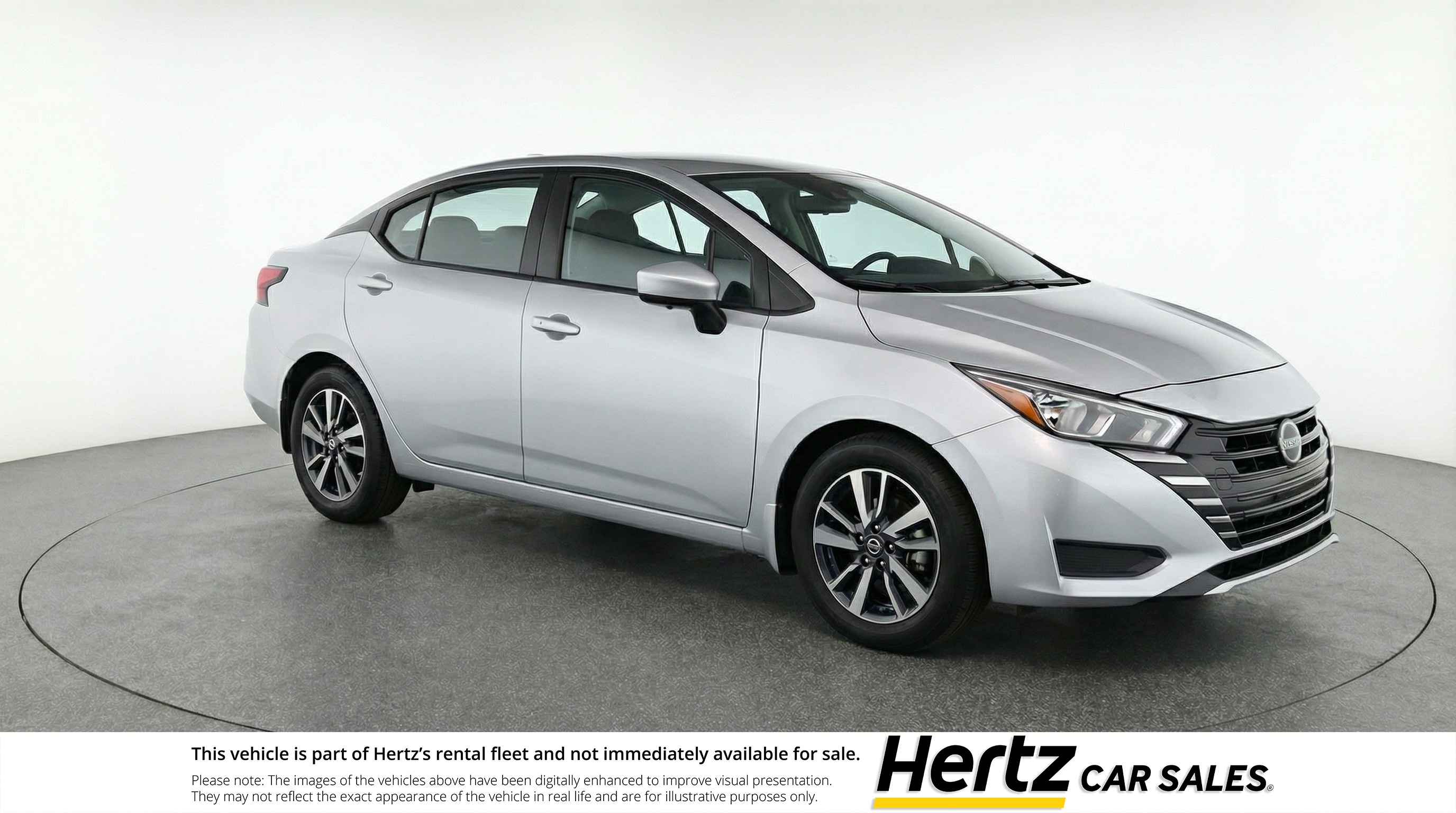 Silver 2025 Nissan Versa SV FWD Sedan Front-Wheel Drive Automatic