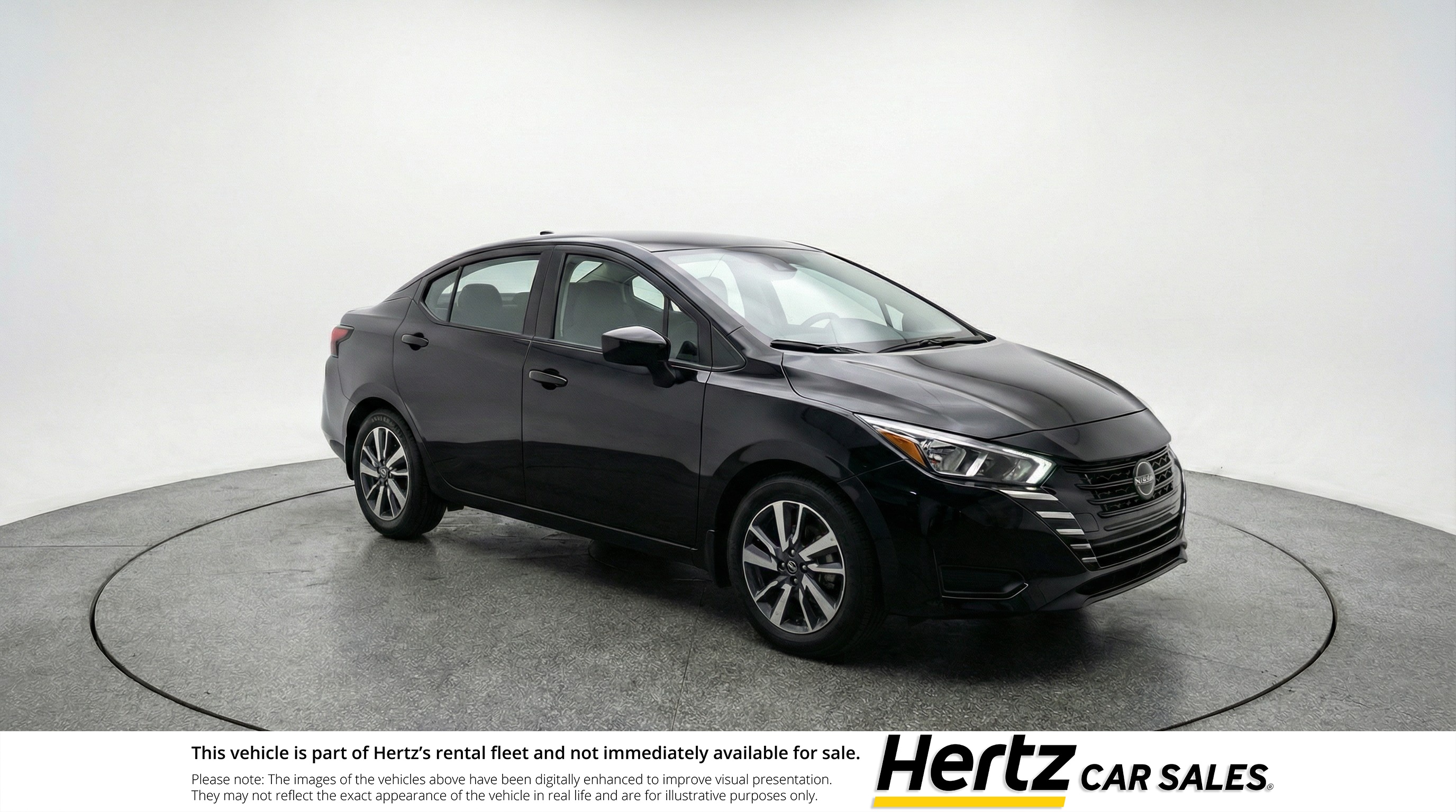Black 2025 Nissan Versa SV FWD Sedan Front-Wheel Drive Automatic