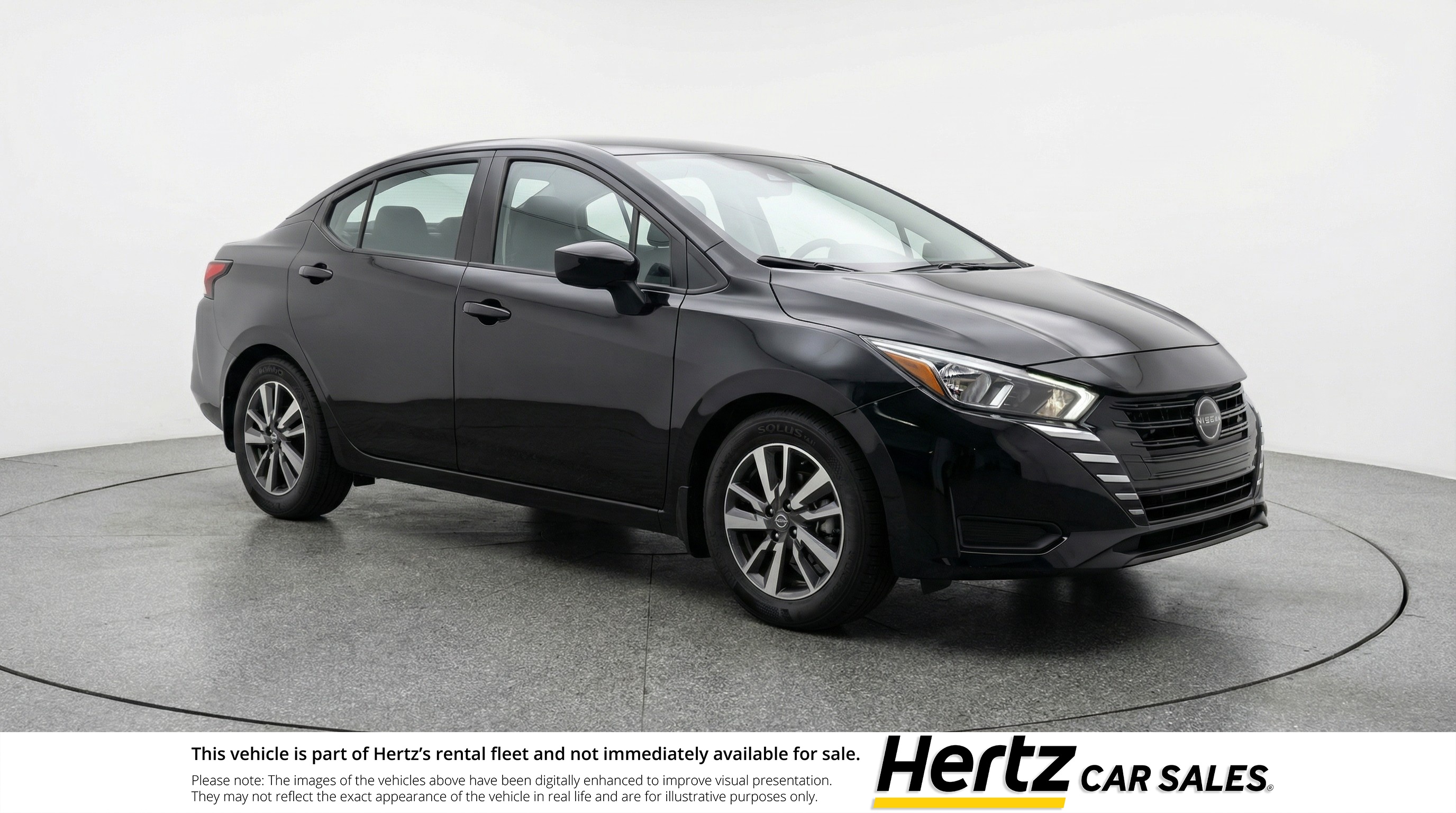 Black 2025 Nissan Versa SV FWD Sedan Front-Wheel Drive Automatic