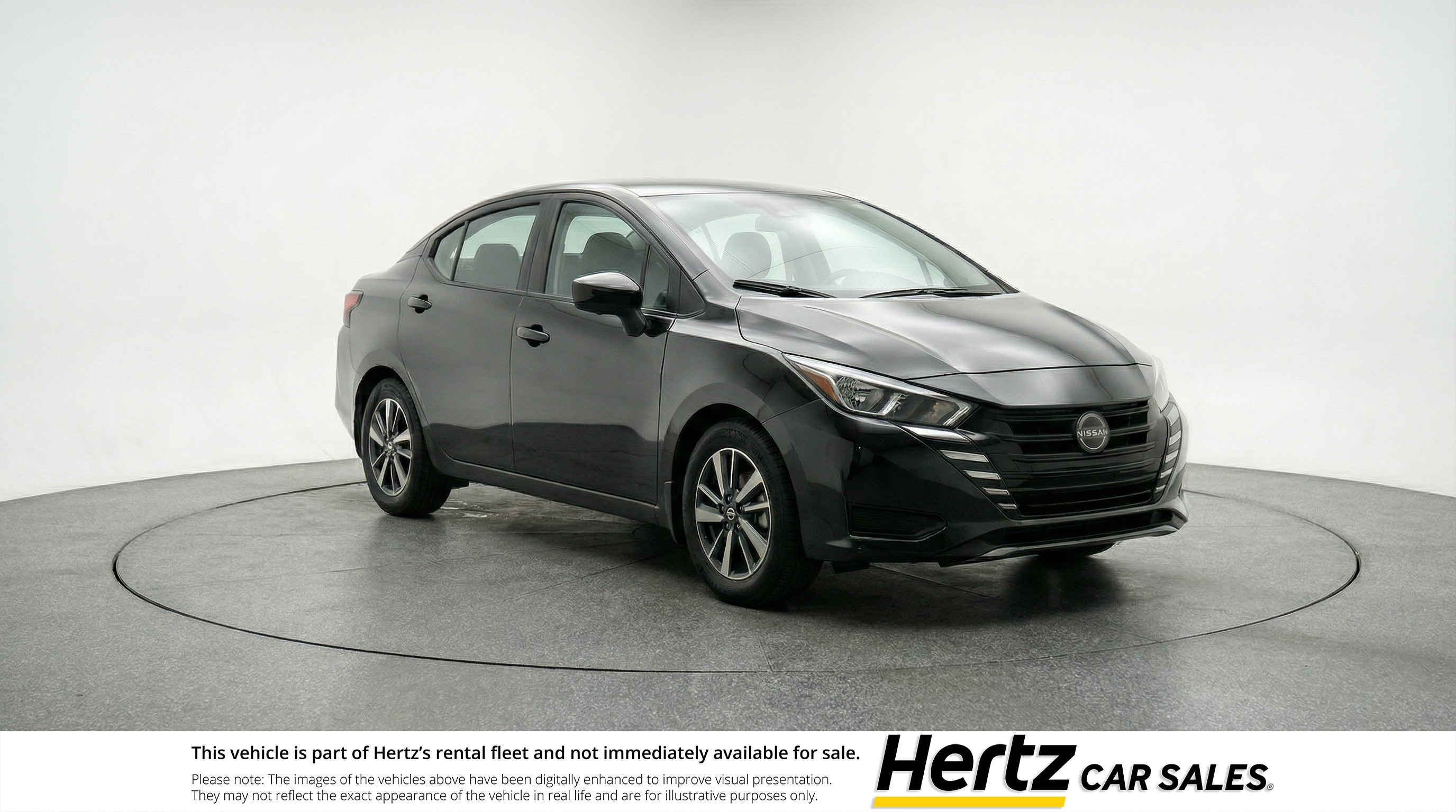 Black 2025 Nissan Versa SV FWD Sedan Front-Wheel Drive Automatic